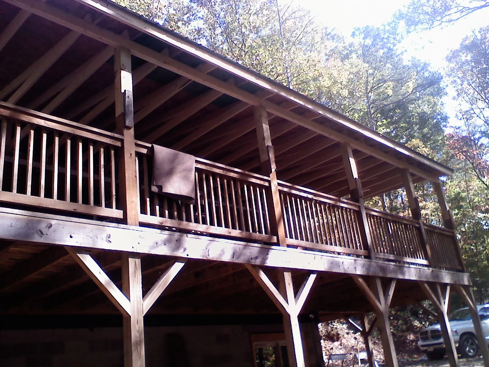 Timber framing under a new elevated porch and deck — Roof Leak Repair in Hoyt by Roofing Brothers